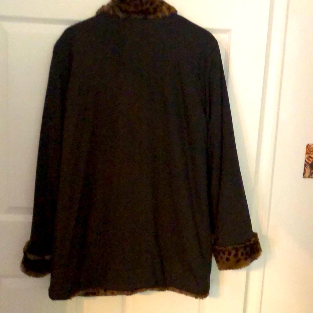 Alpine Co ladies fully reversible coat. Faux animal print reverses to waterproof